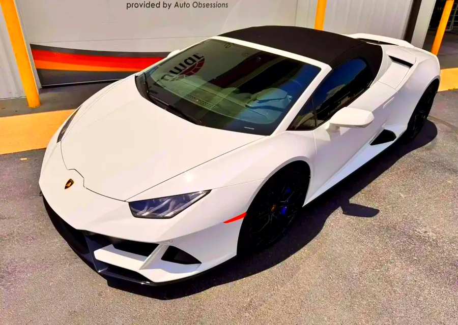 Lamborghini Huracán Spyder outside the Auto Obsessions shop