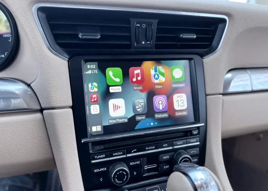 Apple CarPlay running on a factory Porsche dash screen